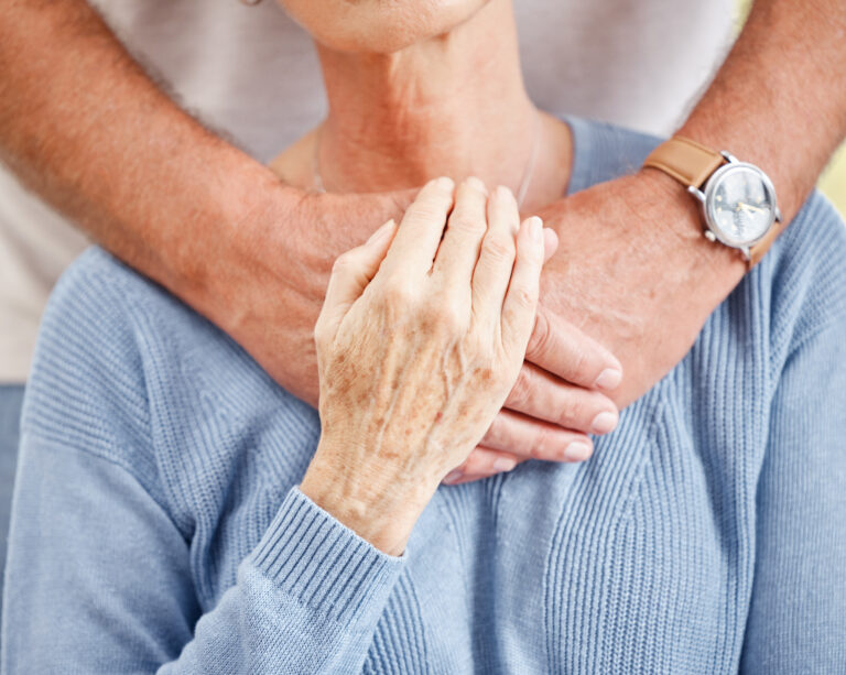 Senior couple caregiving